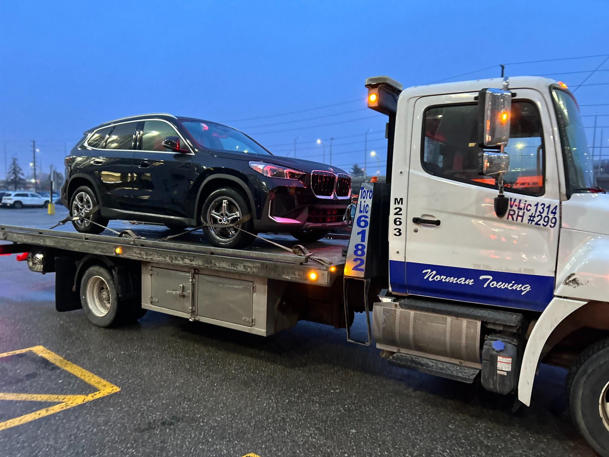 Bmw Luxury Vehicle on Flatbed Tow Truck - Norman Towing