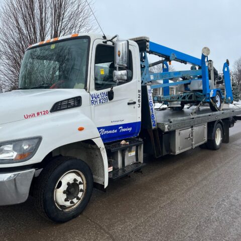 Heavy Duty Equipment Flatbed Towing Service