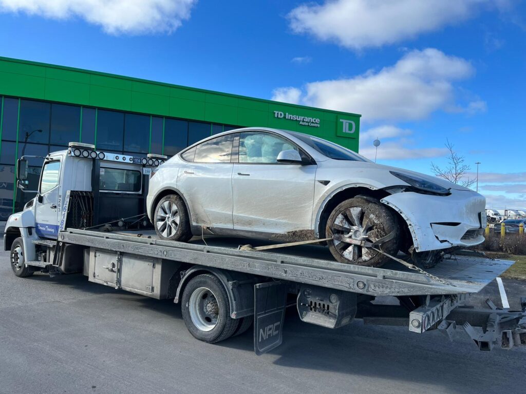 Tesla on a Flatbed Tow Truck - Towing at Markham City