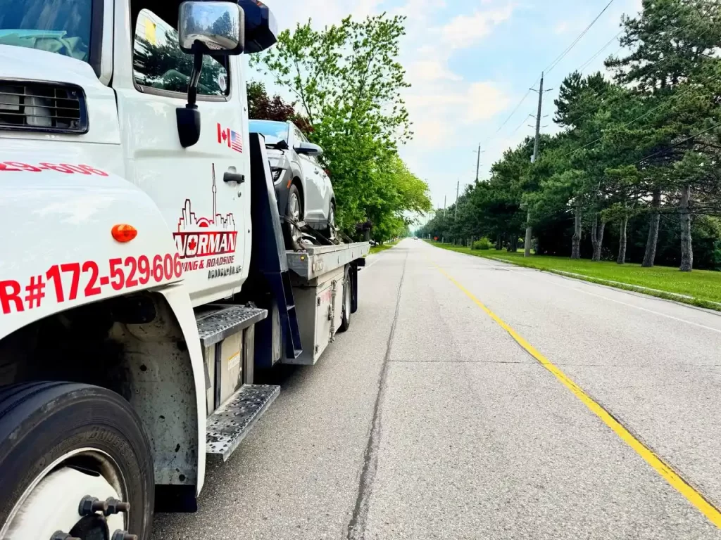 Vehicle being towed from a private parking lot in Halton