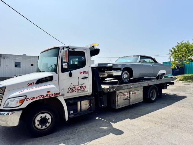 Classic meets reliable — Norman Towing delivering vintage with care.