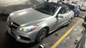 Norman Towing equipment being used to recover a luxury Mercedes-Benz from an underground parking structure in Toronto.